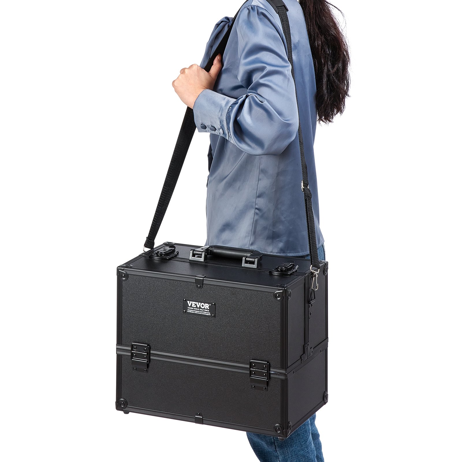 person carrying a VEVOR makeup train case with shoulder strap.
