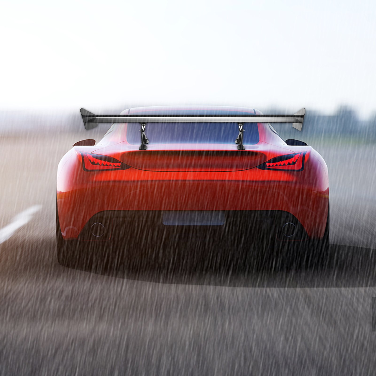 red sports car with VEVOR gt wing spoiler driving in heavy rain.