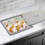 built-in VEVOR ice chest on countertop with beer bottles and soda cans on ice.