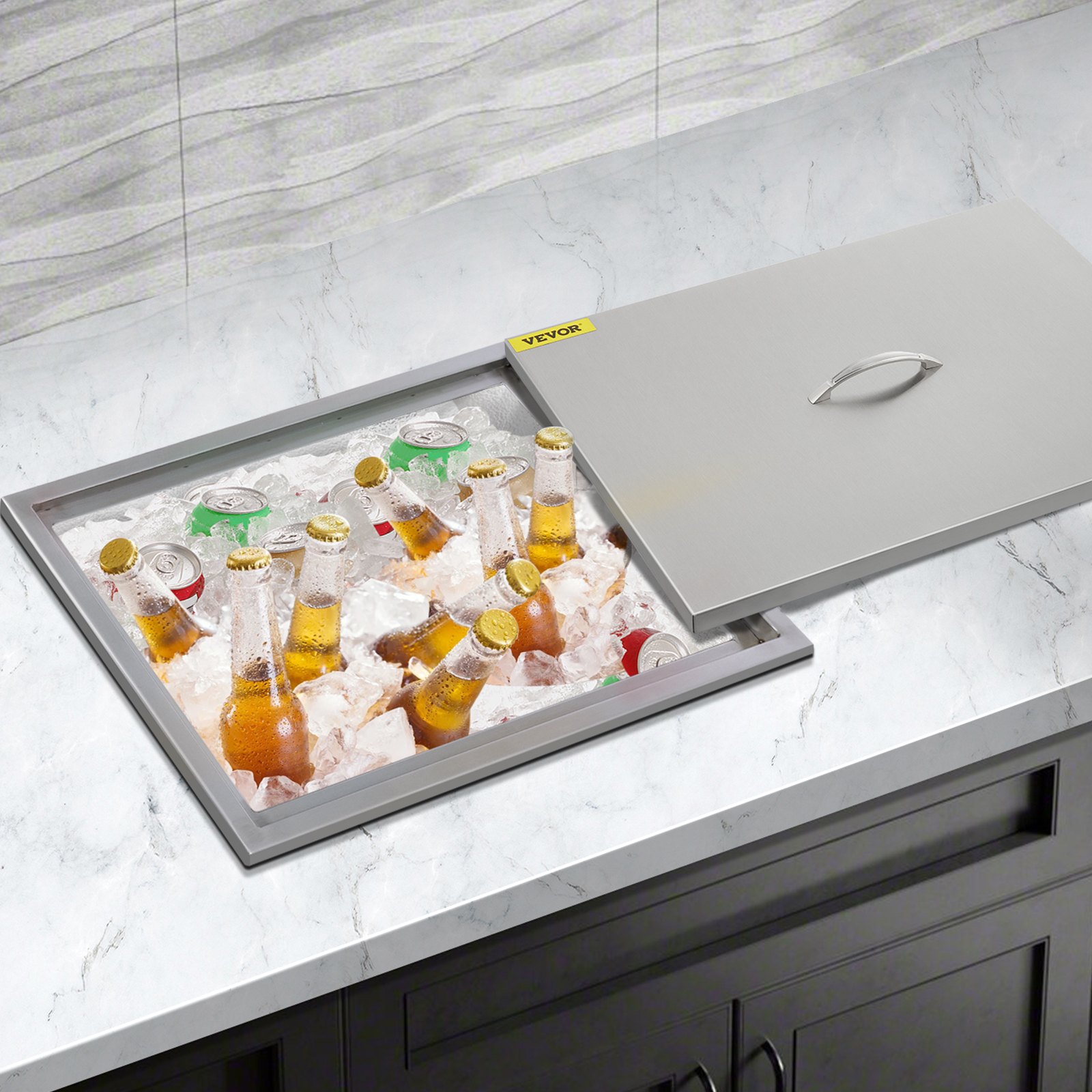 built-in VEVOR ice chest on countertop with beer bottles and soda cans on ice.