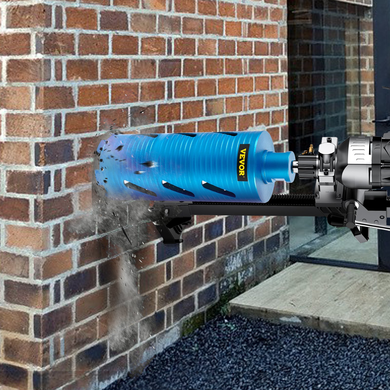 VEVOR diamond core drill bit drilling a brick wall, producing dust and debris.