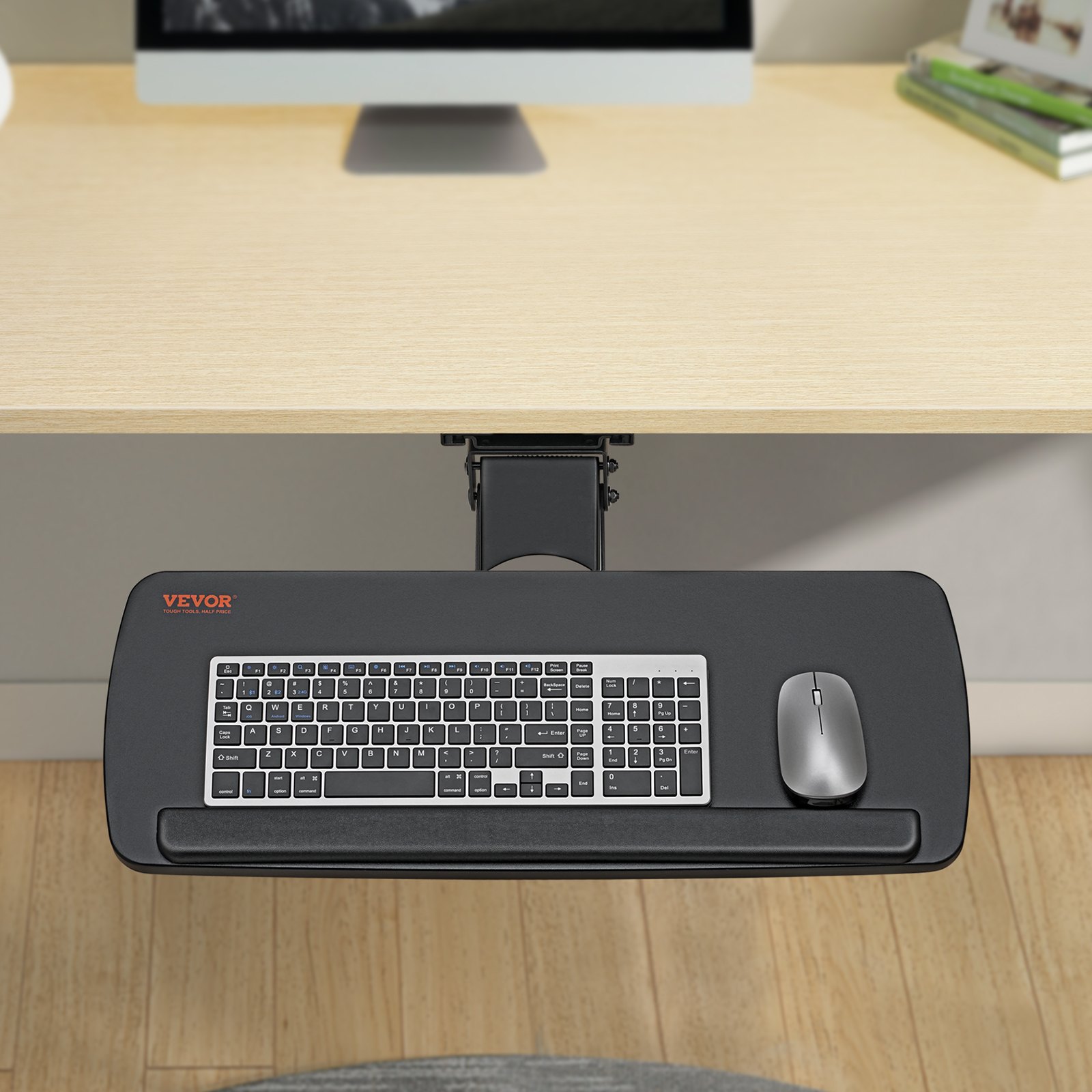 VEVOR keyboard tray mounted under a desk with a keyboard and mouse, next to a computer screen.