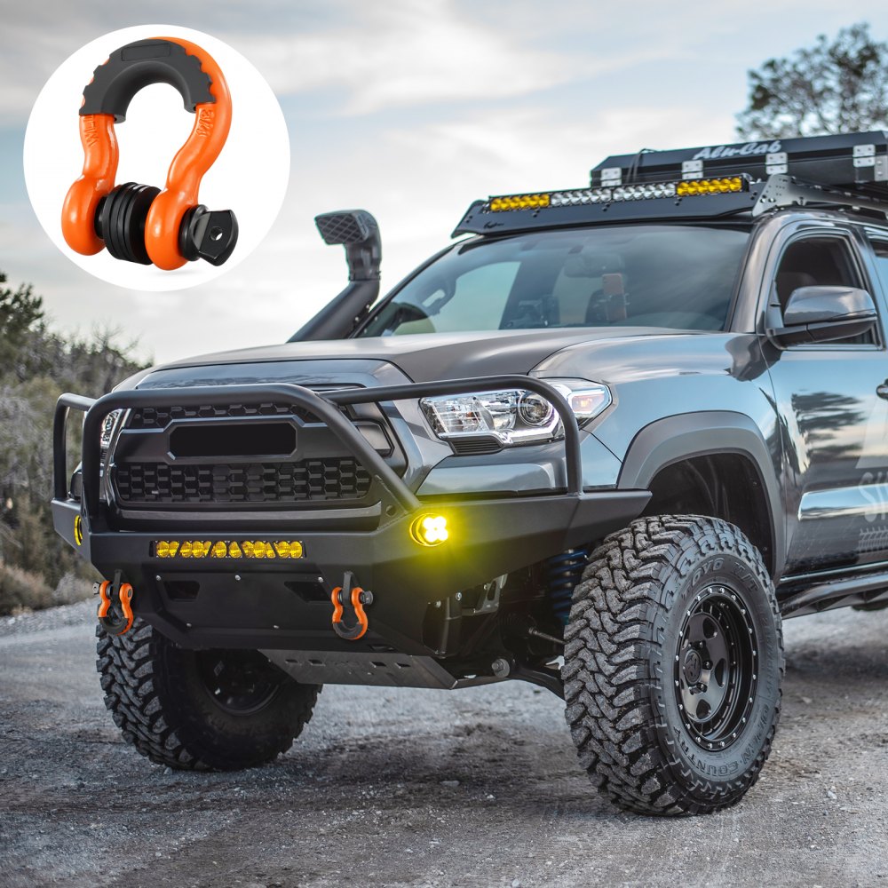 off-road vehicle with VEVOR d-ring shackle in focus, featuring rugged bumper and bright fog lights.