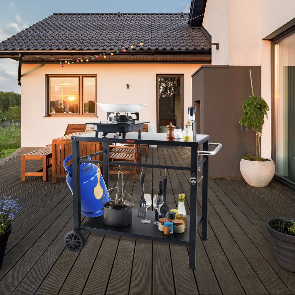VEVOR outdoor grill cart on a wooden deck with utensils, gas cylinder, plants, and cozy patio setup.