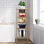 VEVOR cookware stand in kitchen displaying various pots and a plant on top.