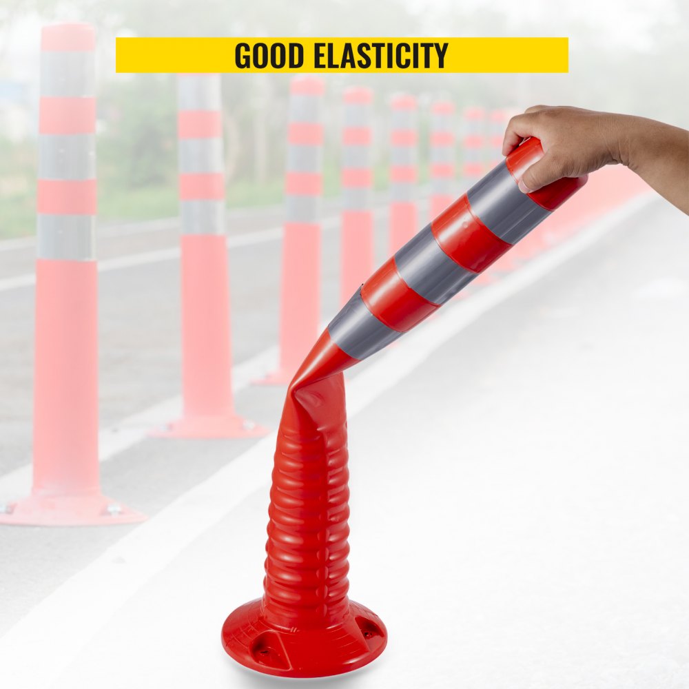 VEVOR traffic delineator cones showing flexibility and durability on a road.