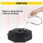 pouring water into the VEVOR plastic stanchion kit base for added stability.