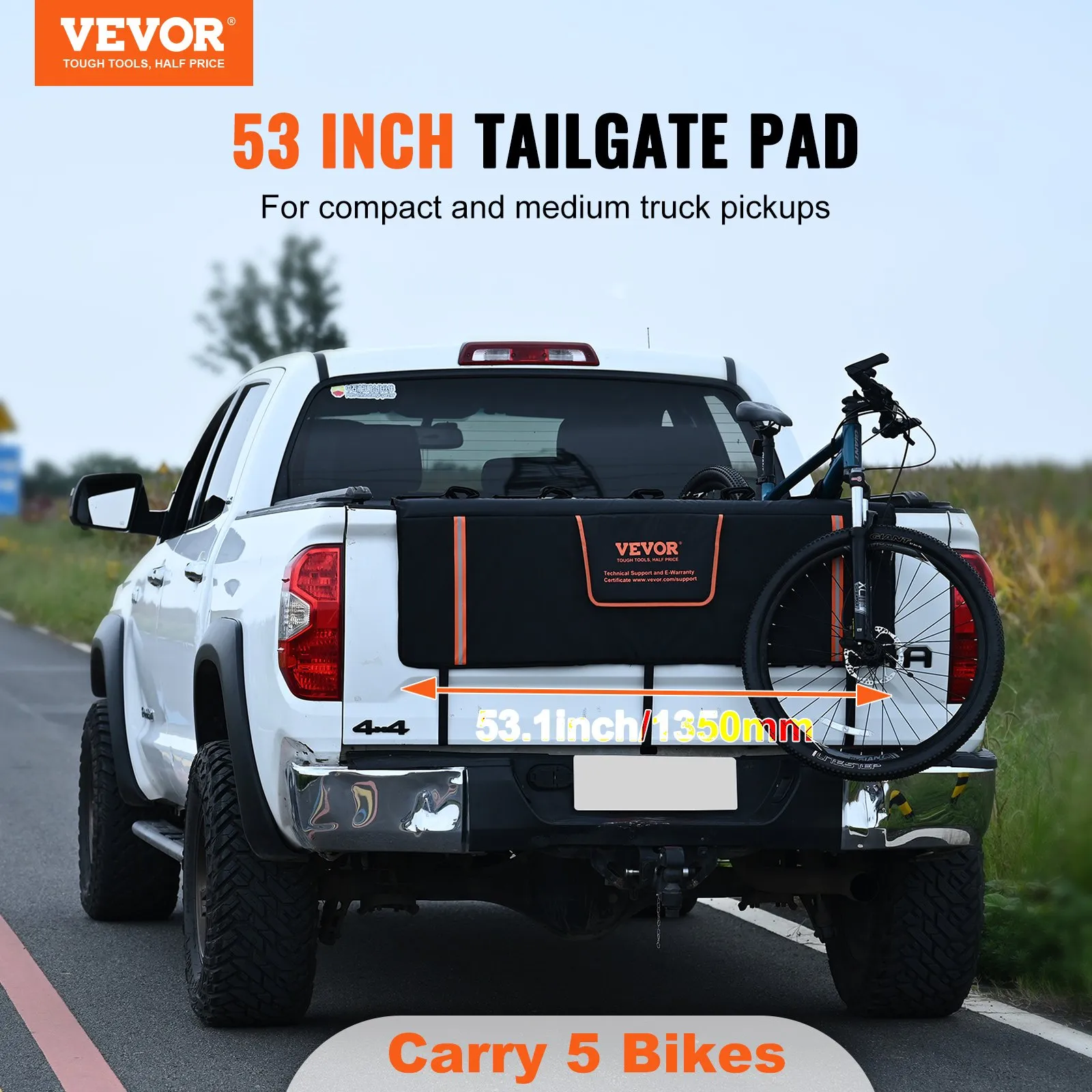 white truck with VEVOR tailgate pad carrying a bike, ideal for compact and medium truck pickups.