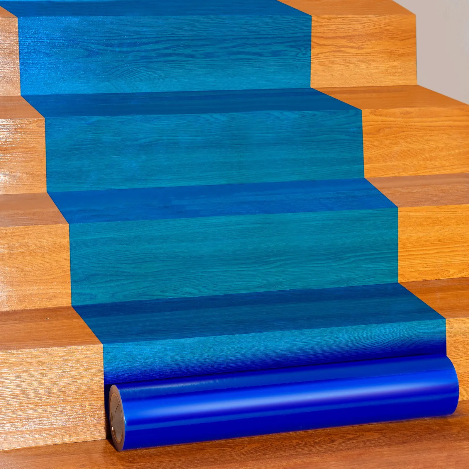 VEVOR carpet protection film on wooden stairs, showcasing durable blue coverage.