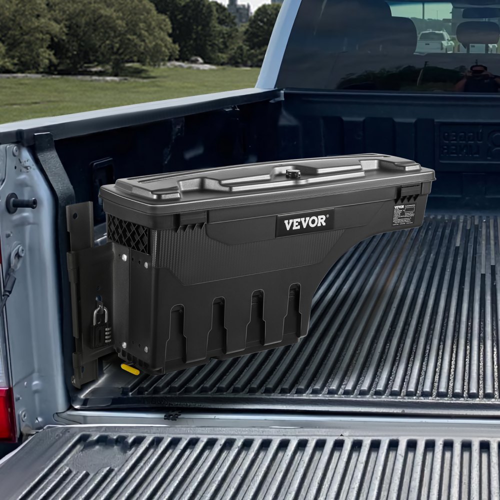 VEVOR truck bed storage box mounted on the side of a black truck bed with lush greenery in the background.