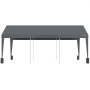 VEVOR carport with a dark canopy supported by sturdy metallic poles and triangular base reinforcements.