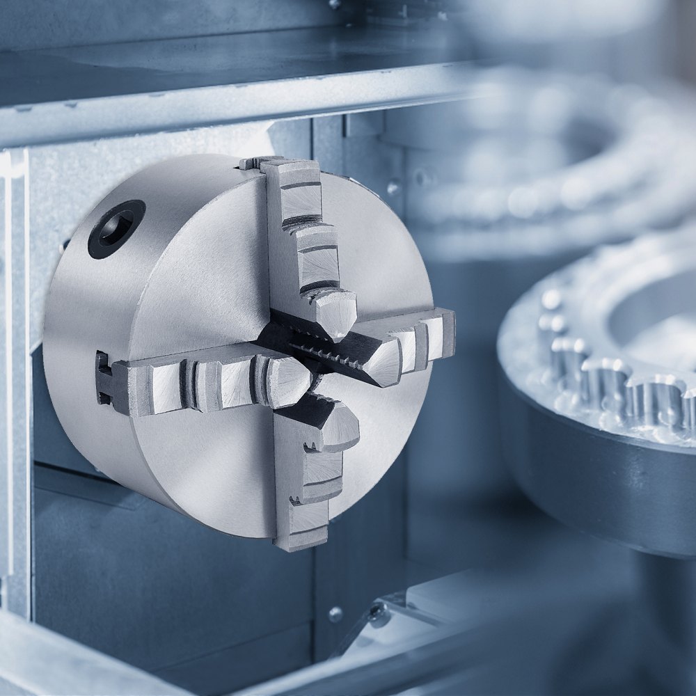 close-up of a VEVOR lathe chuck in a precision machining environment.