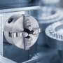 close-up of a VEVOR lathe chuck in a precision machining environment.
