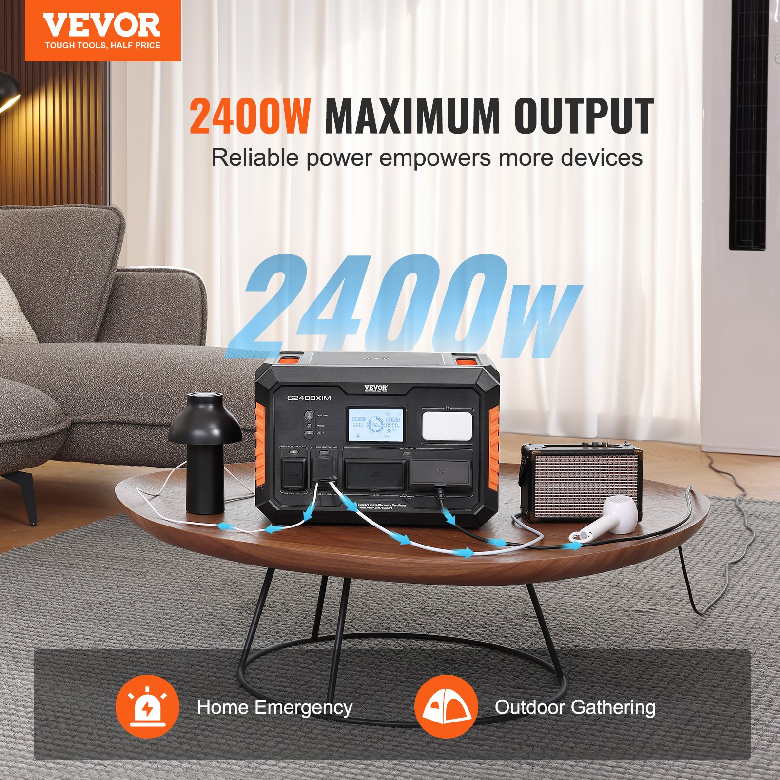 Estación de energía portátil VEVOR sobre mesa en interiores, que alimenta varios dispositivos, salida máxima de 2400 W.