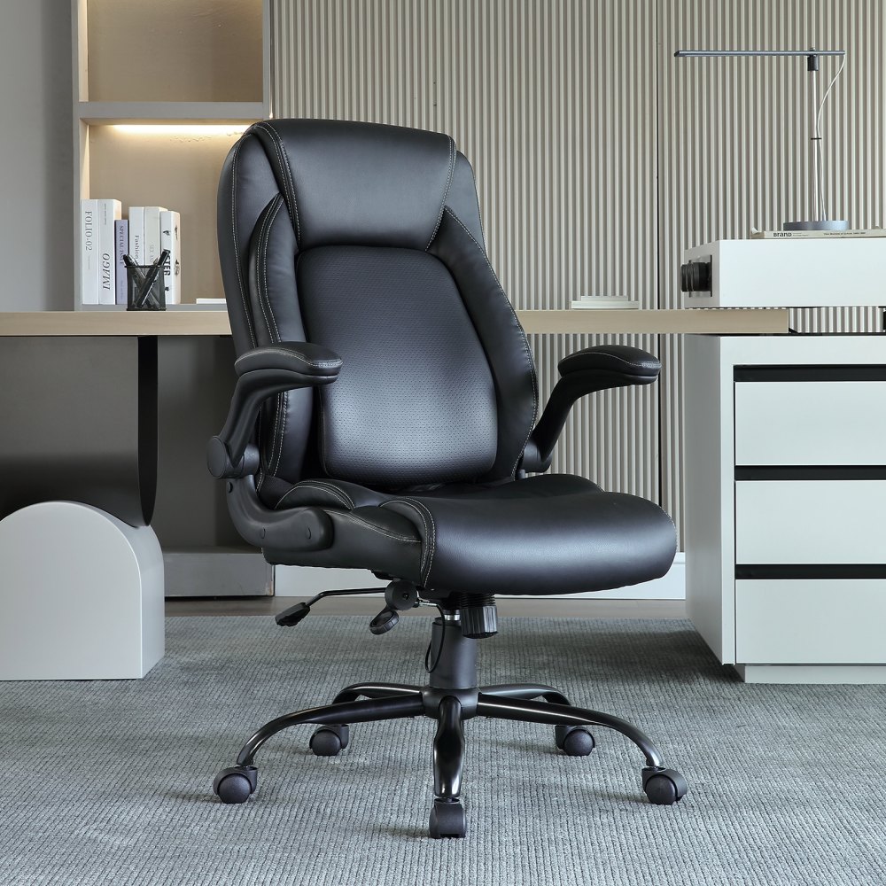 modern black VEVOR executive office chair in a sleek office environment with desk and shelves.