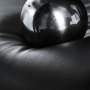 black ball on textured cushion of VEVOR executive office chair in close-up view.