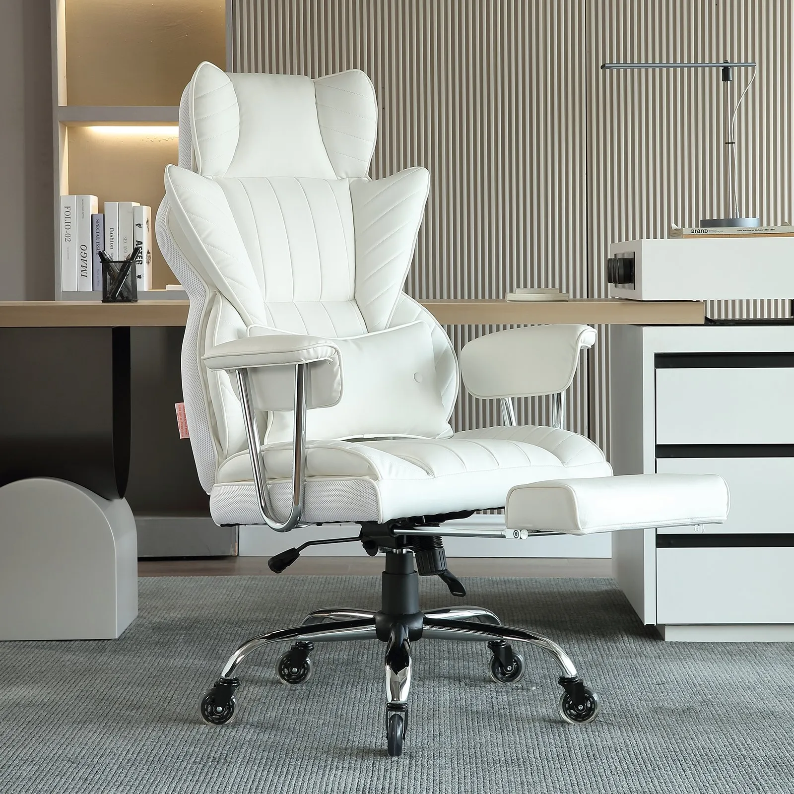 white VEVOR reclining office chair with footrest in modern office setting, near desk and shelves.