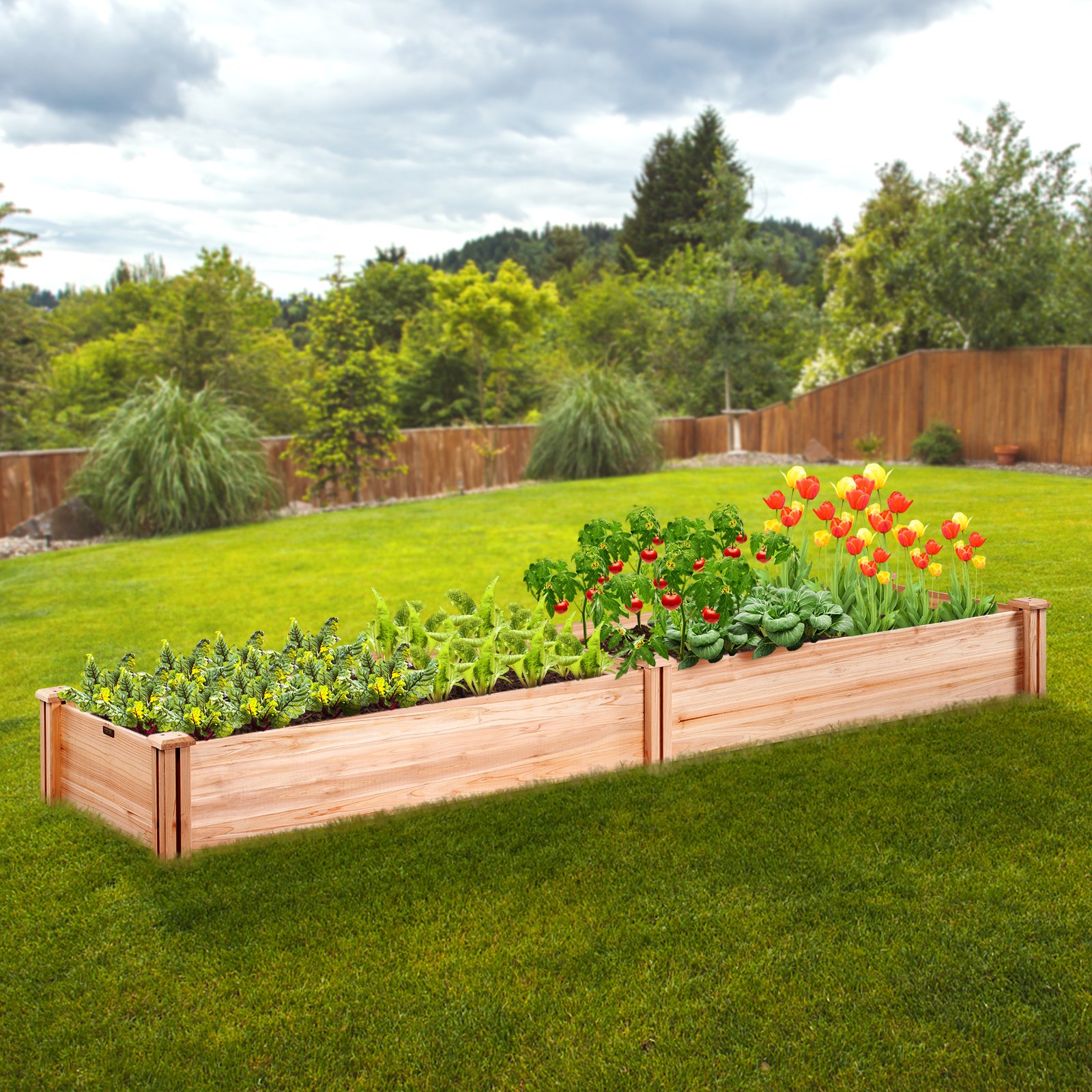 VEVOR raised garden bed filled with assorted vegetables and colorful flowers, set in a lush green backyard.