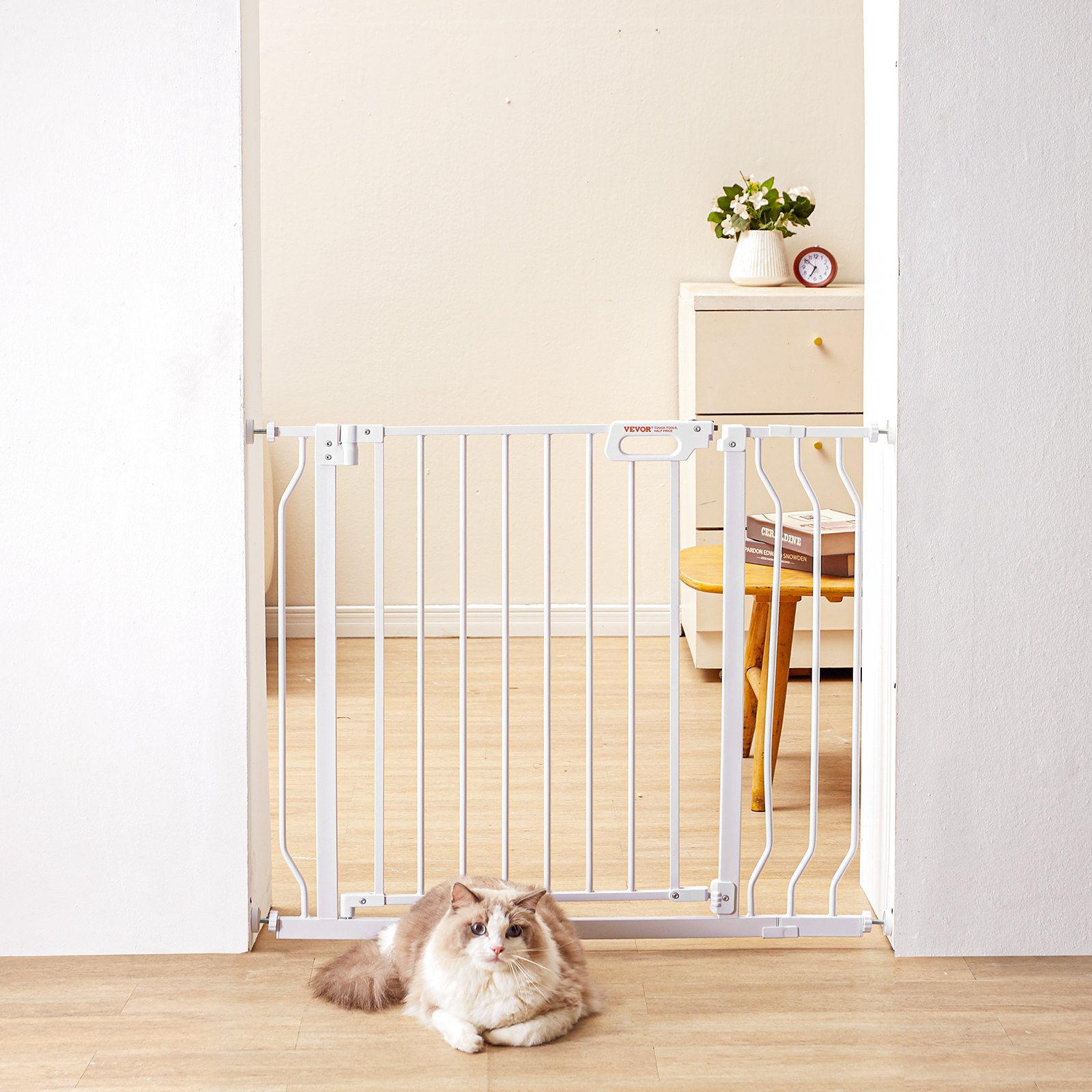 white VEVOR baby gate with vertical bars and latch system.