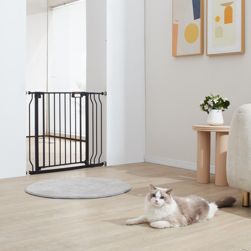 VEVOR baby gate installed in a bright living room with a lounging cat and modern decor.