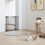 VEVOR baby gate installed in a bright living room with a lounging cat and modern decor.