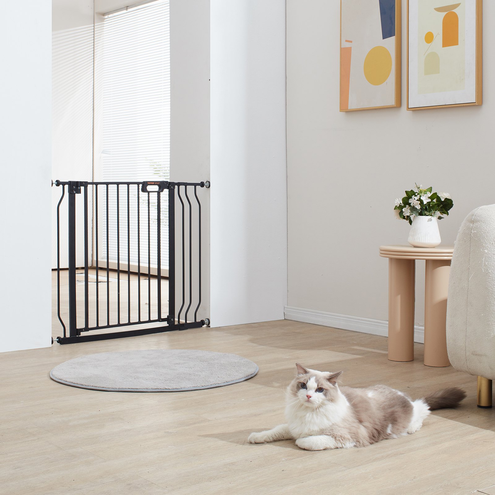 VEVOR baby gate installed in a bright living room with a lounging cat and modern decor.