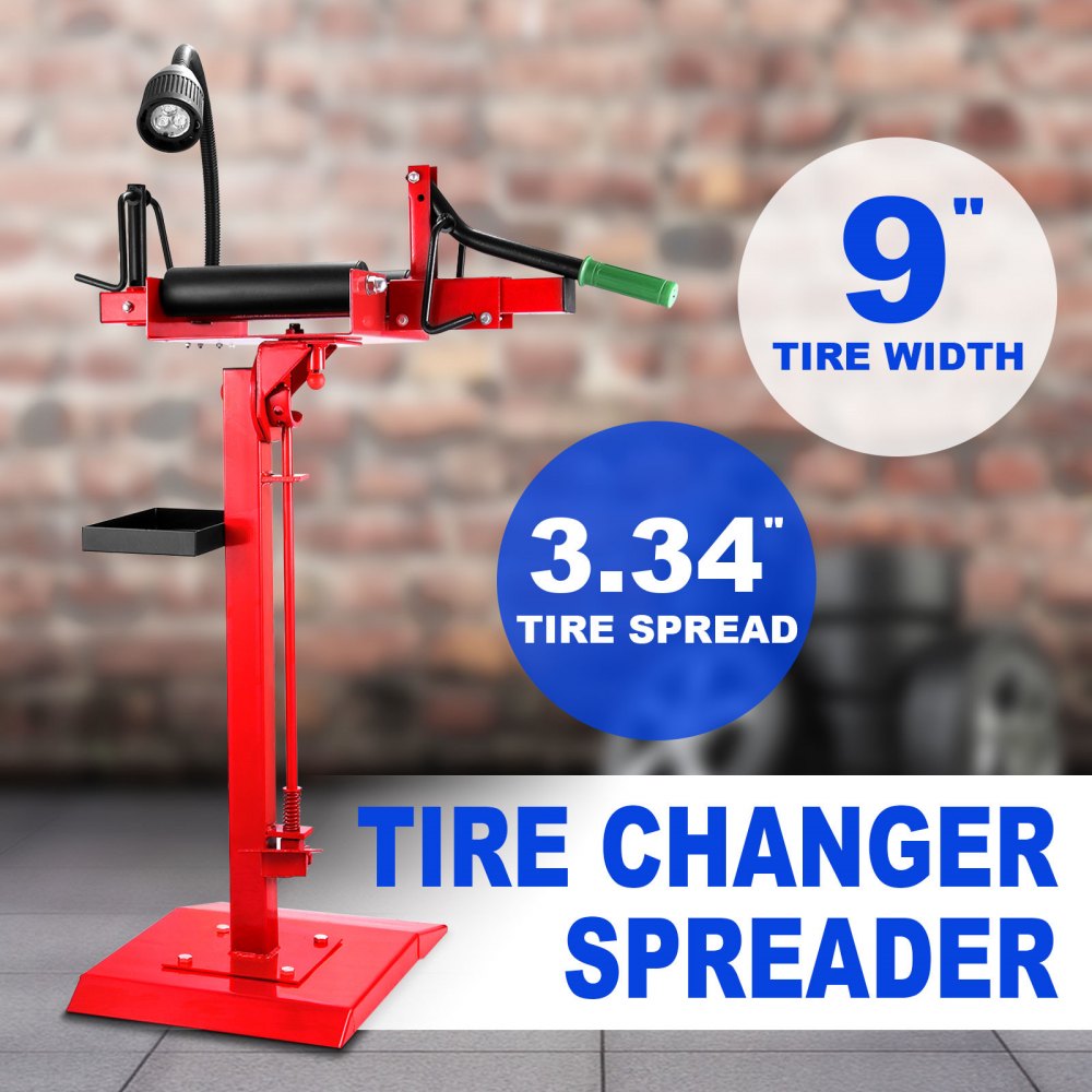 blue VEVOR tire spreader with lamp and tray for repair and inspection.
