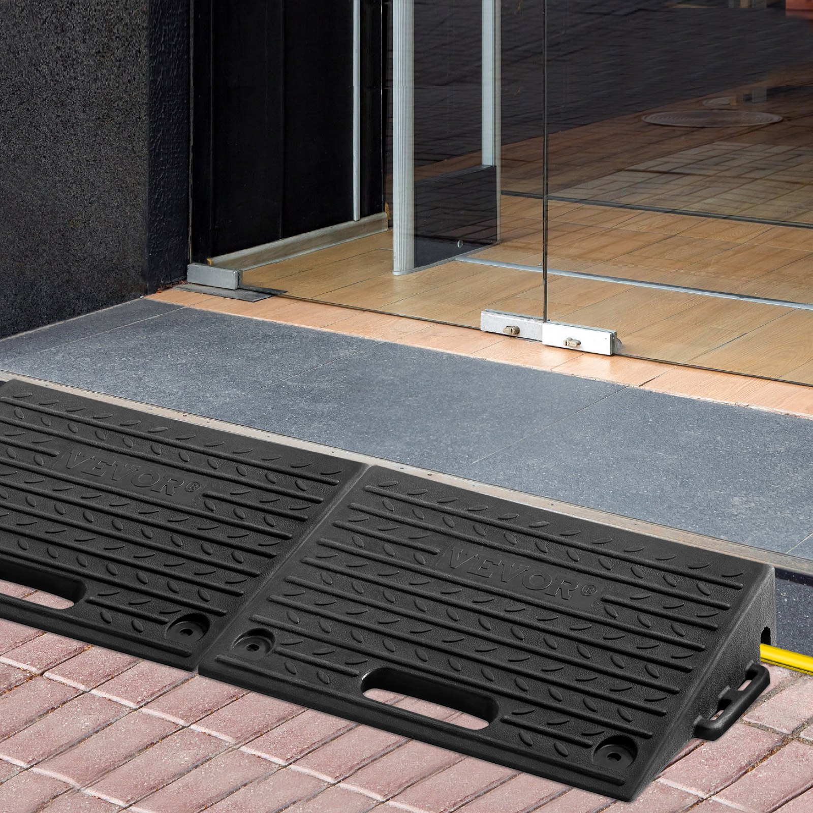 VEVOR rubber threshold ramp at glass door entry providing easy access over tiled threshold.