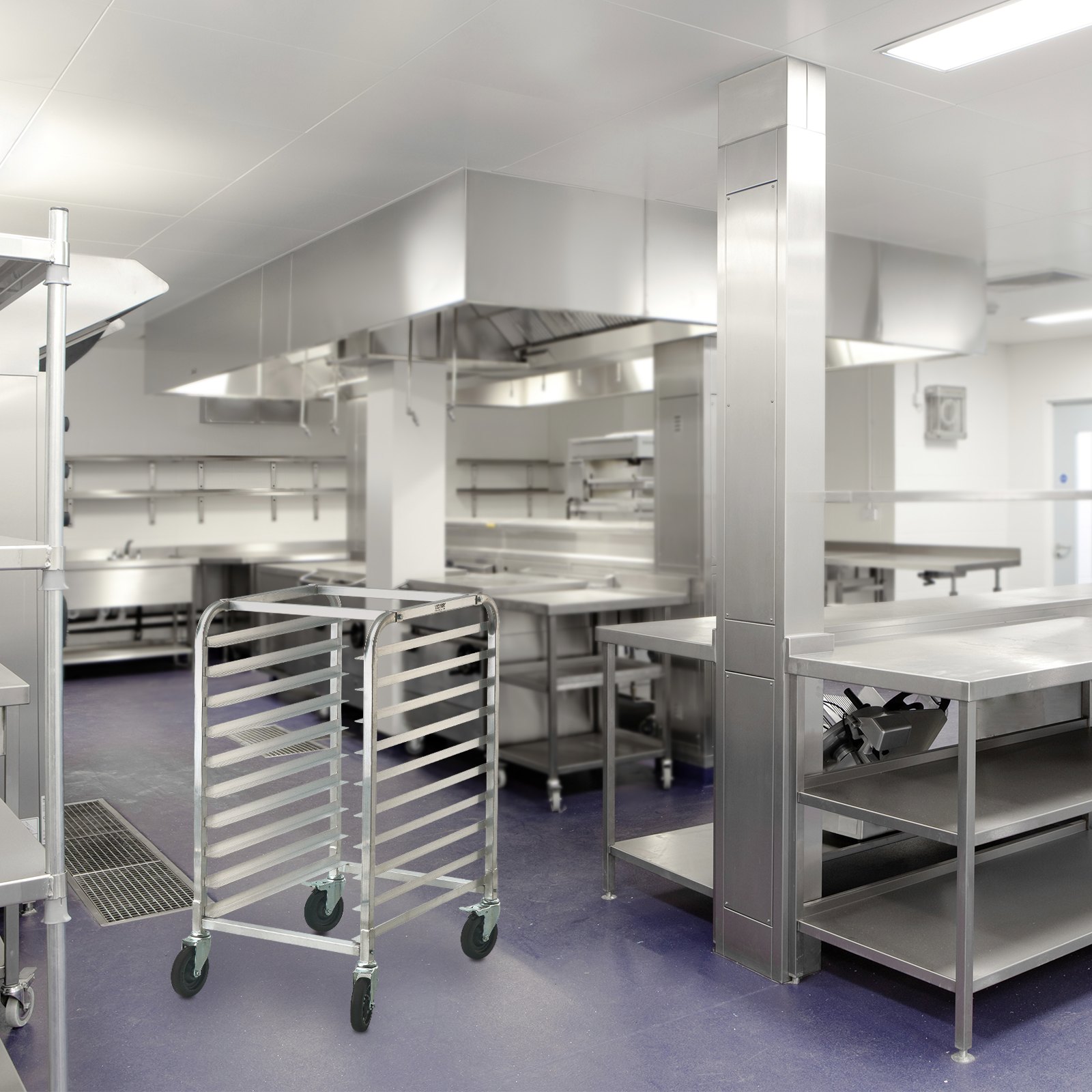 commercial kitchen with stainless steel surfaces and a VEVOR bun pan rack in the center.