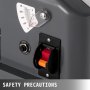 close-up of VEVOR benchtop jointer power switch and safety precautions label.