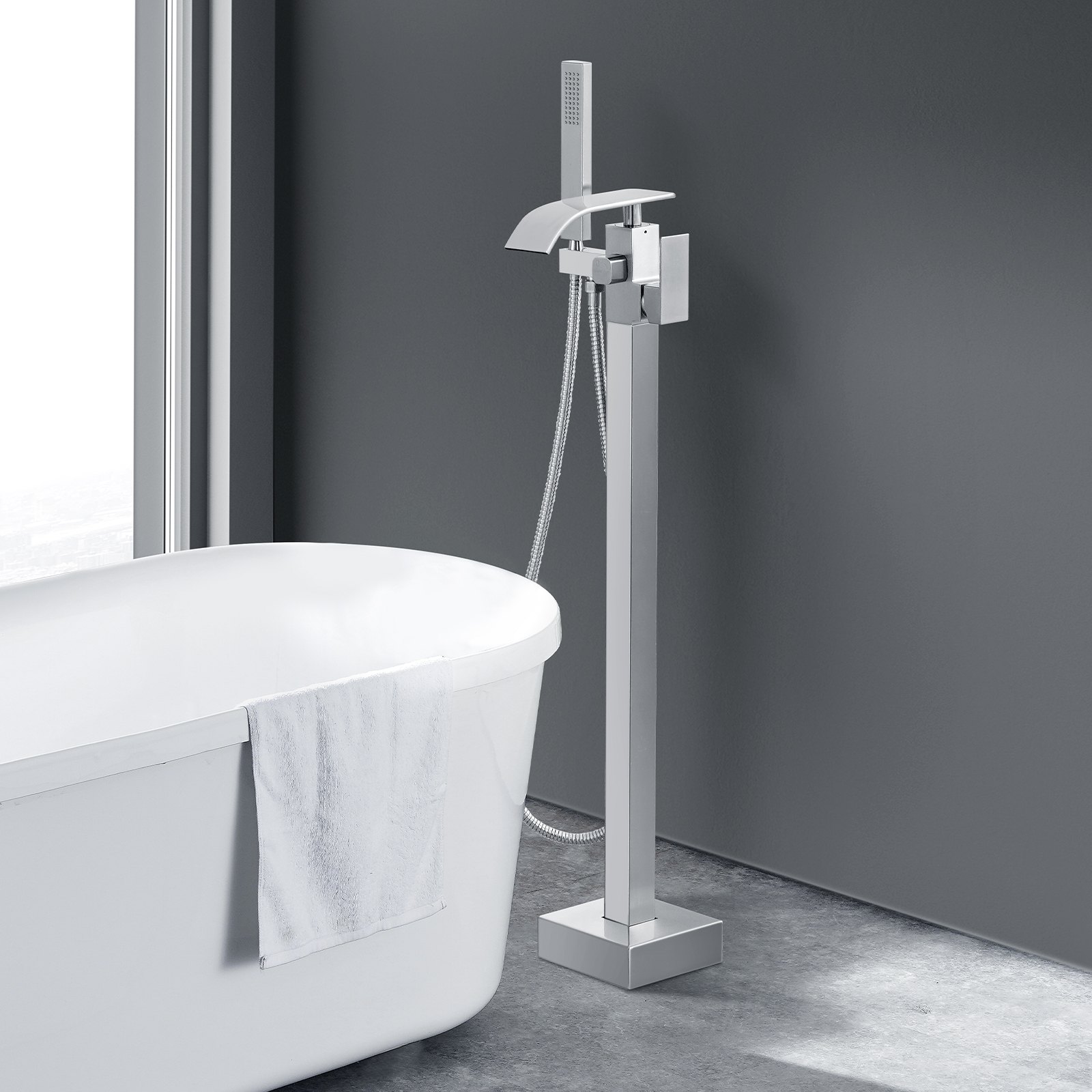 modern bathroom with a shiny VEVOR freestanding bathtub faucet next to a sleek white bathtub.