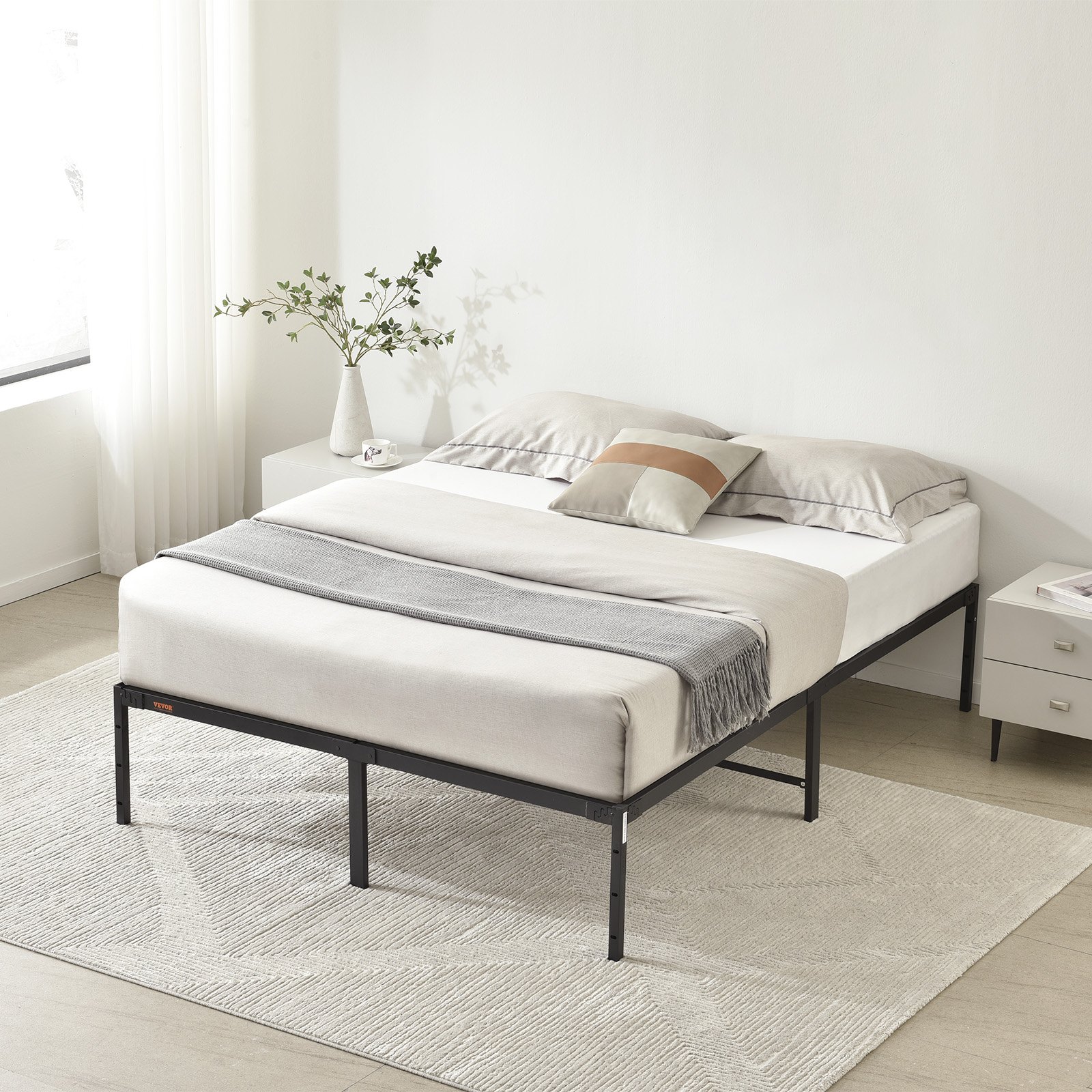 VEVOR 14 inch metal bed frame with beige bedding, gray throw, and minimalist bedroom decor.