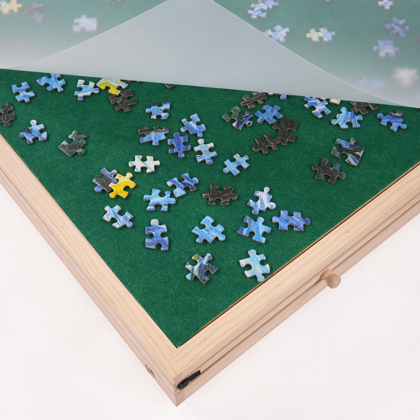 VEVOR puzzle table with partially assembled puzzle pieces on a green felt surface and a transparent cover.