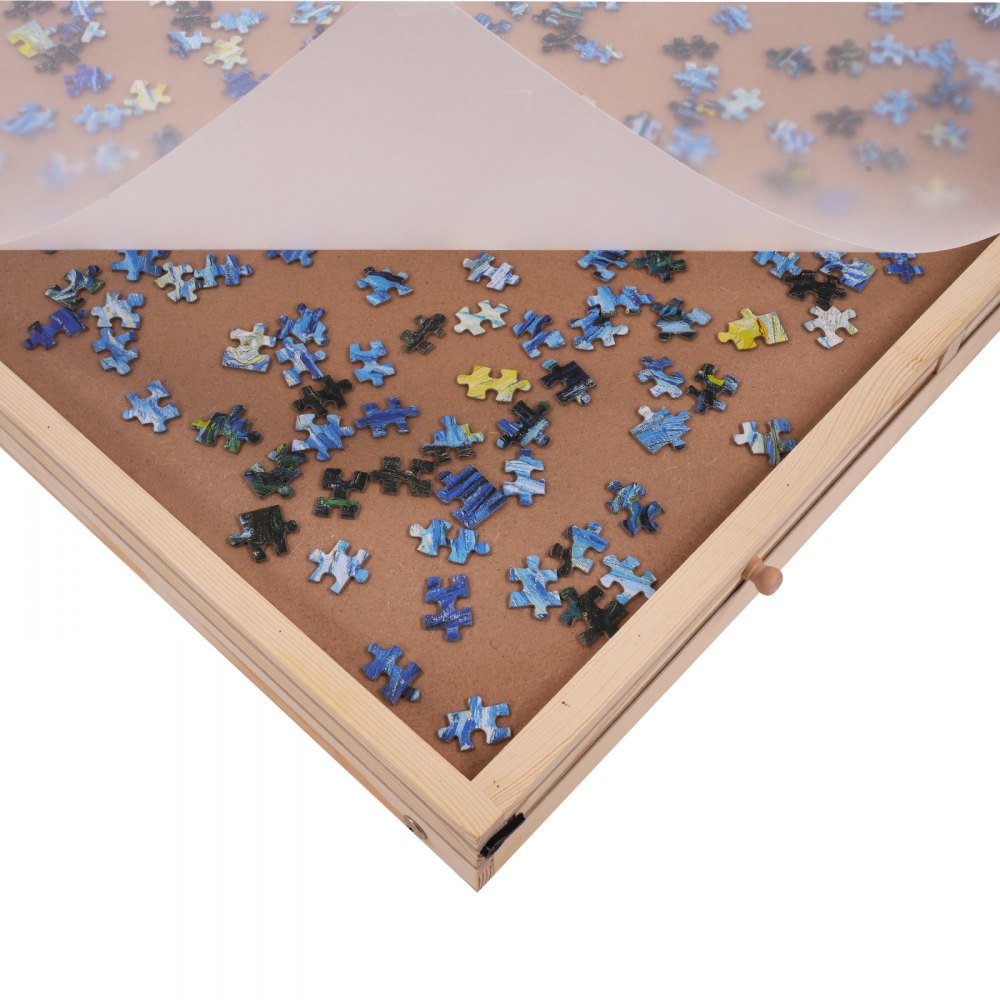 VEVOR puzzle table with unfinished wooden frame, scattered puzzle pieces, and a protective cover.