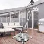 VEVOR pressure washer surface cleaner on a wooden patio with outdoor furniture and grill.