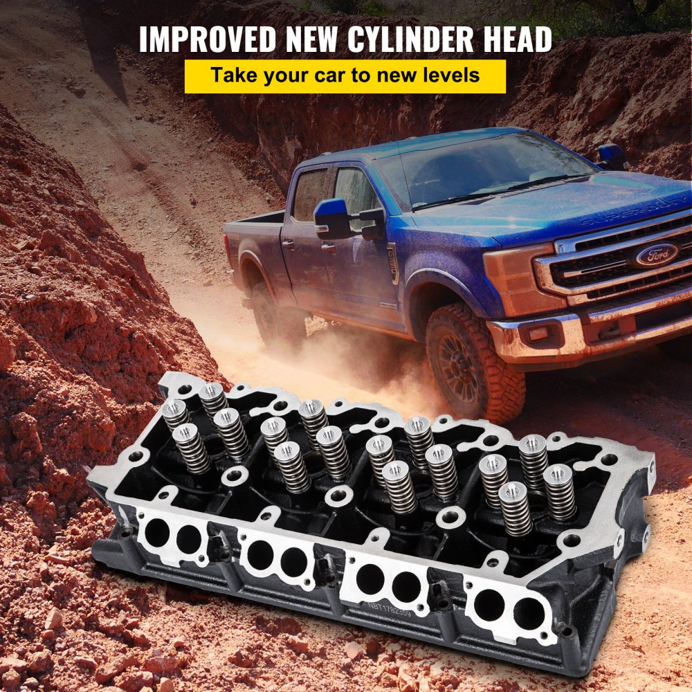 VEVOR cylinder head assembly in front of a blue truck on a rugged dirt road.