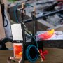 VEVOR propane knife forge with dual burners and heated metal on anvil.