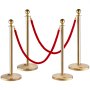 gold stanchion posts with red velvet ropes arranged in a barrier setup, VEVOR stanchion post.