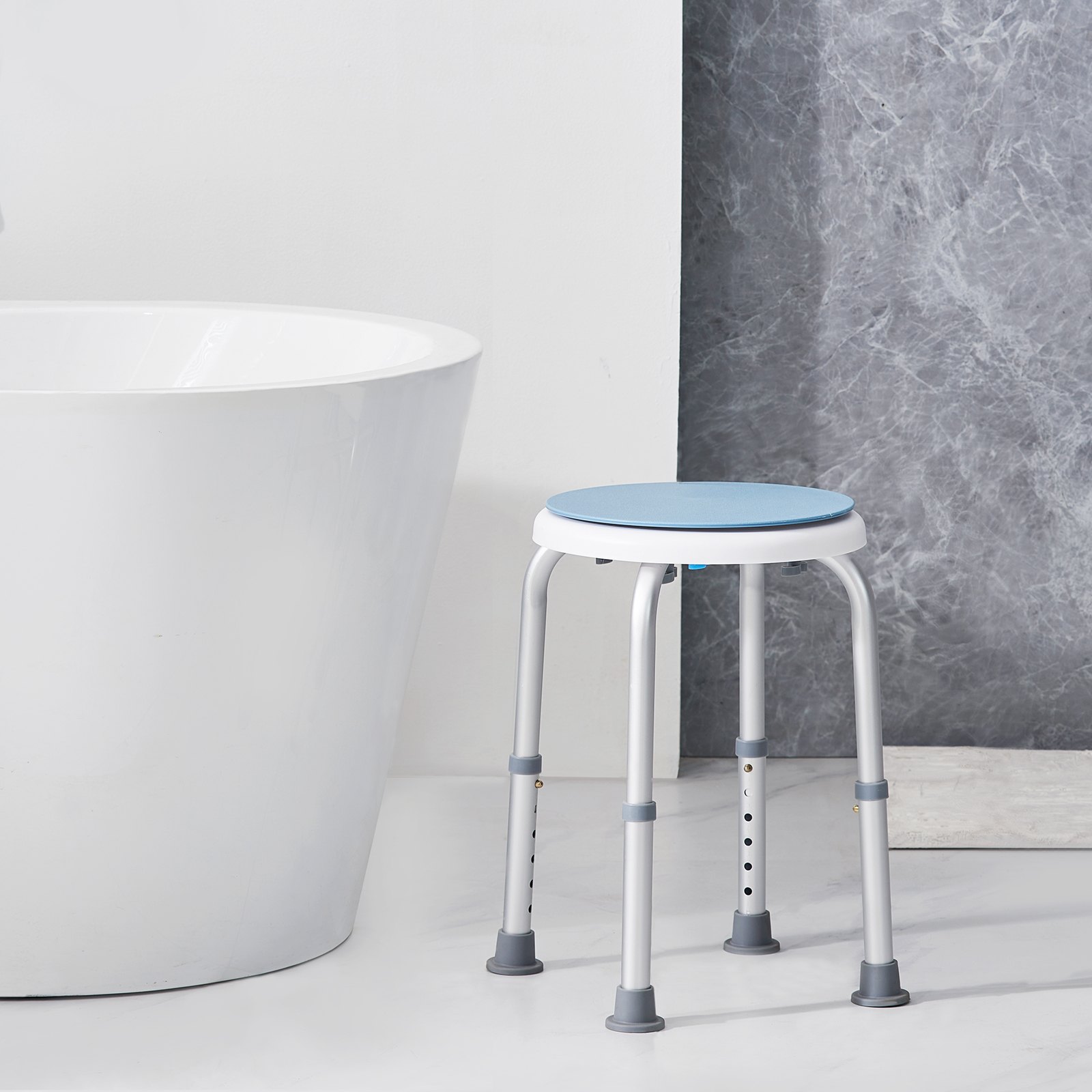 white freestanding bathtub and VEVOR shower chair with blue seat on adjustable legs against marble wall.