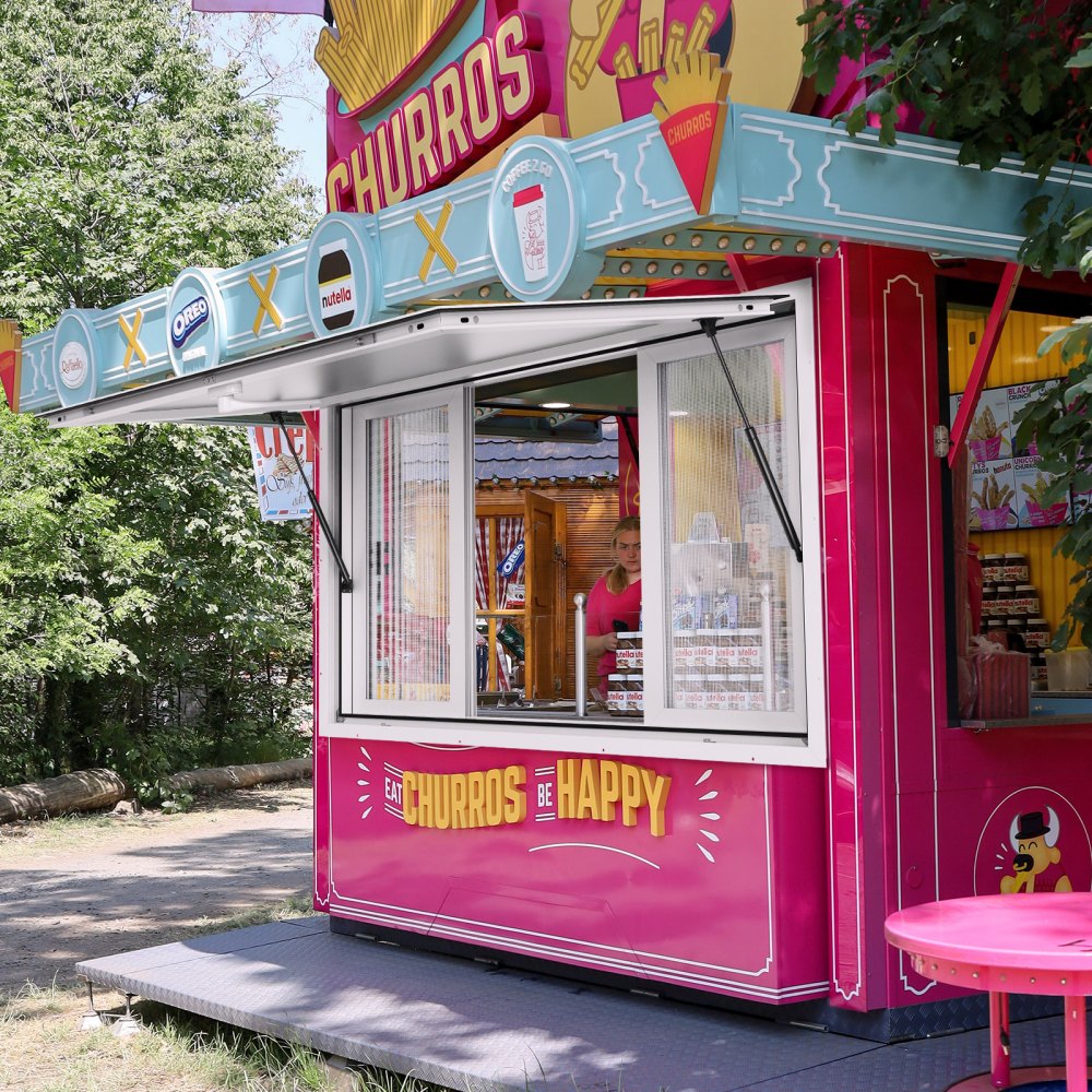 colorful churros stand with VEVOR concession window, nutella and oreo logos, and "eat churros be happy" sign.