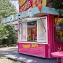 colorful churros stand with VEVOR concession window, nutella and oreo logos, and "eat churros be happy" sign.