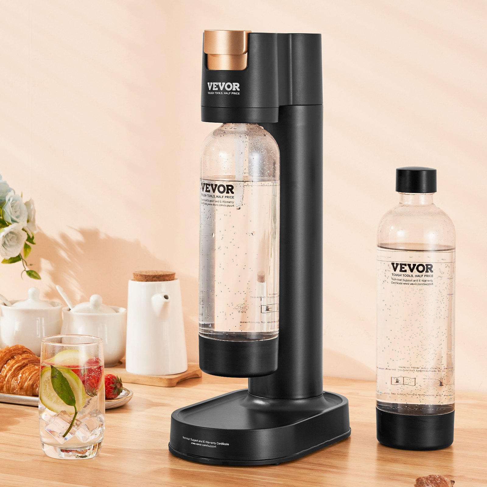 VEVOR sparkling water maker in black, with additional bottle and fresh fruit-infused water glass.