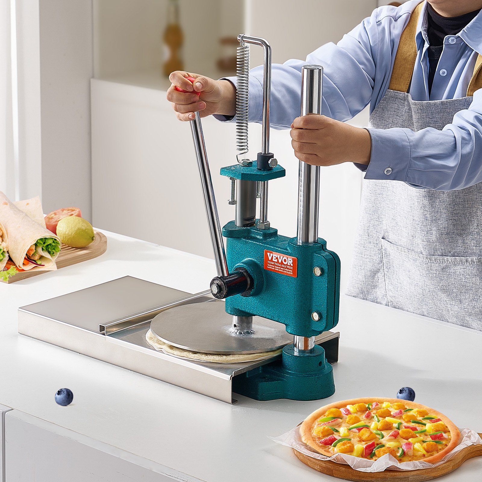 person using VEVOR pizza dough press machine to shape dough in modern kitchen setting.
