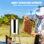 beekeeper using VEVOR honey extractor with frame of honeycomb outdoors, green field in background.