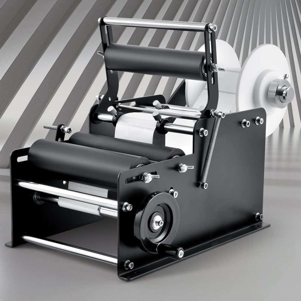VEVOR manual round labeling machine with rollers and spindle on a striped gray background.