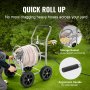 VEVOR hose reel cart in garden with ergonomic handle, storage basket, and hose rolled neatly.