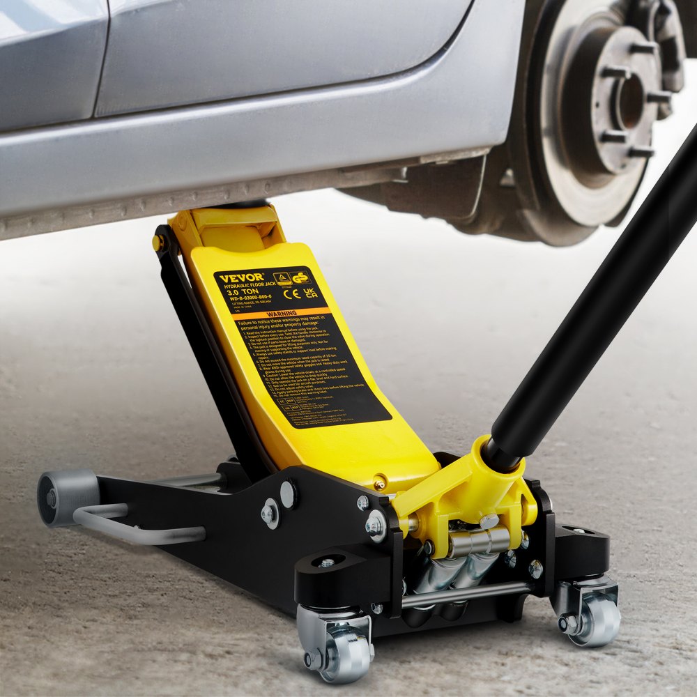 car lifted with a yellow VEVOR racing floor jack, showcasing a detailed view of the tool in use.
