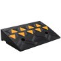 VEVOR rubber curb ramp with yellow triangular patterns and two holes on a black textured surface.