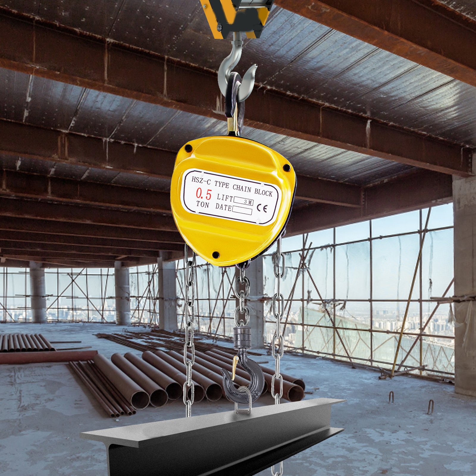 yellow VEVOR chain hoist lifting a steel beam in a construction site.