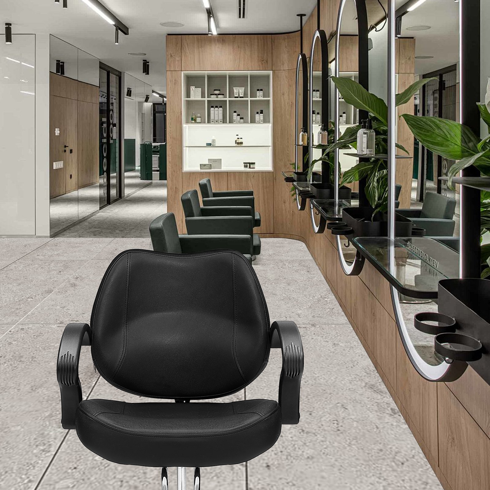 black VEVOR salon chair in modern salon with wooden accents, green chairs, and round mirrors.